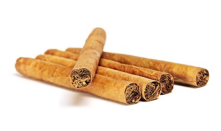 simsearch:400-05292494,k - little cigars close up, isolated on white Foto de stock - Super Valor sin royalties y Suscripción, Código: 400-06790927