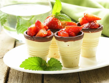 strawberry and vanilla ice cream - wafer cups with strawberry salad - a great dessert Stock Photo - Budget Royalty-Free & Subscription, Code: 400-06792271