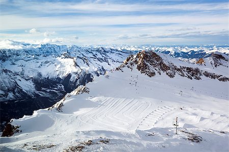 winter with ski slopes of kaprun resort next to kitzsteinhorn peak in austrian alps Foto de stock - Super Valor sin royalties y Suscripción, Código: 400-06792748