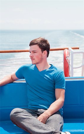Young man in vacation on a yacht Stock Photo - Budget Royalty-Free & Subscription, Code: 400-06792959