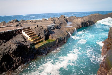 A rocky landscape with alot of water on Tenerife, Spain Foto de stock - Royalty-Free Super Valor e Assinatura, Número: 400-06793088