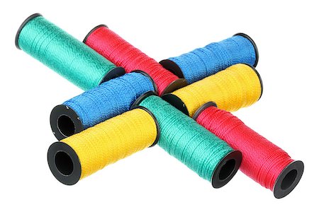 simsearch:6109-08701544,k - Eight spools of thread isolated on white background Stock Photo - Budget Royalty-Free & Subscription, Code: 400-06793354