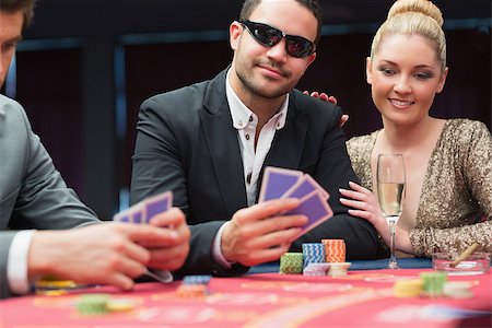 Couple at the poker table in casino Foto de stock - Super Valor sin royalties y Suscripción, Código: 400-06801845