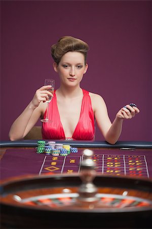 Woman playing roulette alone in casino Stock Photo - Budget Royalty-Free & Subscription, Code: 400-06802020