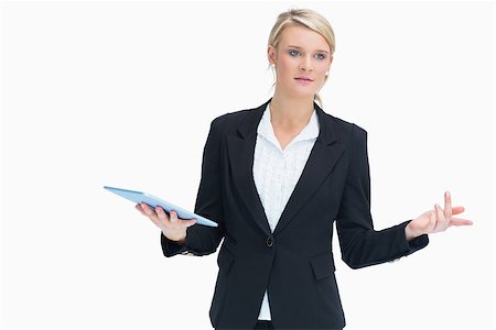 simsearch:400-06802290,k - Businesswoman wondering while holding tablet and planning Stock Photo - Budget Royalty-Free & Subscription, Code: 400-06802115