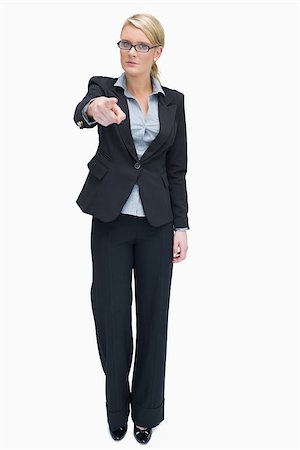 simsearch:400-06802290,k - Angry businesswoman standing and pointing Stock Photo - Budget Royalty-Free & Subscription, Code: 400-06802279