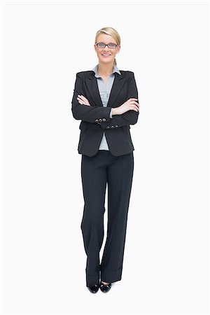 simsearch:400-06802290,k - Smiling businesswoman standing with folded arms Stock Photo - Budget Royalty-Free & Subscription, Code: 400-06802270