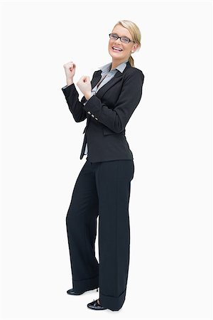 simsearch:400-06802290,k - Proud businesswoman cheering and smiling Stock Photo - Budget Royalty-Free & Subscription, Code: 400-06802284