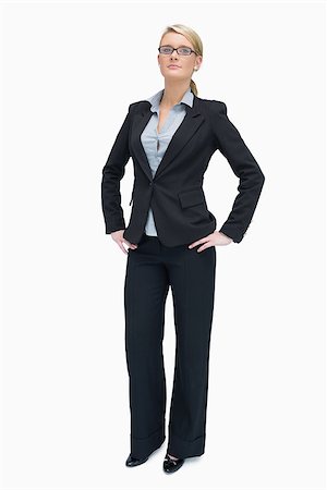 simsearch:400-06802290,k - Successful businesswoman standing with her hands on the hip Stock Photo - Budget Royalty-Free & Subscription, Code: 400-06802281