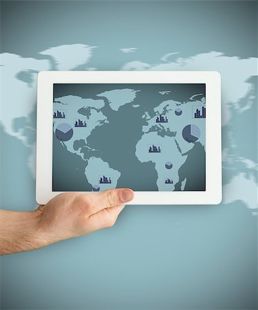 Hand holding a tablet PC showing business world map graphic on world map background Stock Photo - Budget Royalty-Free & Subscription, Code: 400-06802424