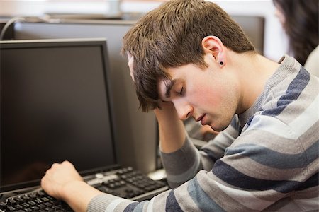 sleeping in a classroom - Student sitting sleeping at the computer desk in college Stock Photo - Budget Royalty-Free & Subscription, Code: 400-06803134