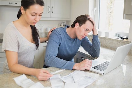 simsearch:400-06803524,k - Two people calculating finances and using the laptop Stock Photo - Budget Royalty-Free & Subscription, Code: 400-06803529