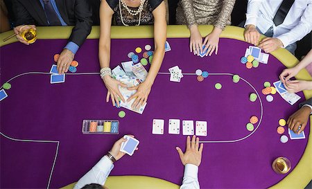 People playing poker woman grabbing money Stock Photo - Budget Royalty-Free & Subscription, Code: 400-06803734