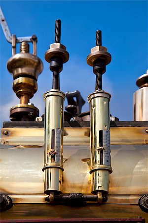 steam valve - Pair of old brass gauges on a traction engine Stock Photo - Budget Royalty-Free & Subscription, Code: 400-06847770