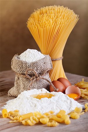 sack flour - Pasta with ingredients - flour and eggs on old wooden table Stock Photo - Budget Royalty-Free & Subscription, Code: 400-06848864