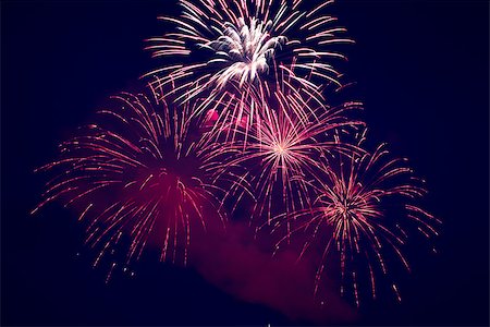 simsearch:400-07093371,k - Fireworks on the dark sky during the night of the feast. Fotografie stock - Microstock e Abbonamento, Codice: 400-06854070