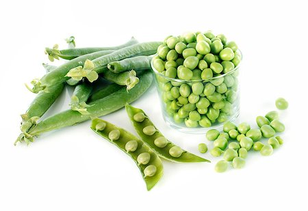 pod peas - fresh peas in front of white background Stock Photo - Budget Royalty-Free & Subscription, Code: 400-06854135