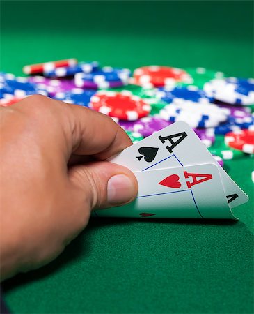 Colorful poker chips and two Ace closeup on green cloth Stock Photo - Budget Royalty-Free & Subscription, Code: 400-06854518