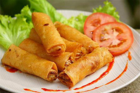Fried Chinese Traditional Spring rolls food with vegetable Fotografie stock - Microstock e Abbonamento, Codice: 400-06855881