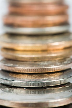 simsearch:400-07295448,k - Stacks of coins white isolated studio shot Stock Photo - Budget Royalty-Free & Subscription, Code: 400-06856048
