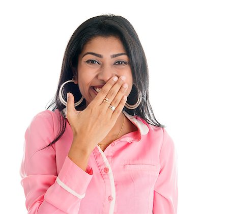 Indian woman giggles covering her mouth with hand, portrait of beautiful Asian female model isolated on white Foto de stock - Super Valor sin royalties y Suscripción, Código: 400-06856132