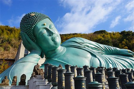 simsearch:400-05924770,k - FUKUOKA - FEBRUARY 9: The Reclining Buddha of Nanzoin Temple February 9, 2013 in Fukuoka, JP. The temple was moved to the spot in 1899 from Wakayama Prefecture. Photographie de stock - Aubaine LD & Abonnement, Code: 400-06856512