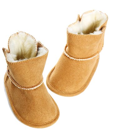 simsearch:400-04939110,k - Pair of brown winter boots over pure white background Photographie de stock - Aubaine LD & Abonnement, Code: 400-06857031