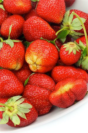 simsearch:400-08020671,k - Perfect Ripe Strawberries with Stems Straight from Garden in white plate closeup Stock Photo - Budget Royalty-Free & Subscription, Code: 400-06857430