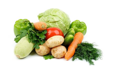 simsearch:400-06857433,k - Heap of Raw Vegetables with Cabbage, Carrot, Green Bell Peppers, Squash, Potatoes, Tomato, Cucumbers, Parsley and Dill isolated on white background Foto de stock - Super Valor sin royalties y Suscripción, Código: 400-06857432