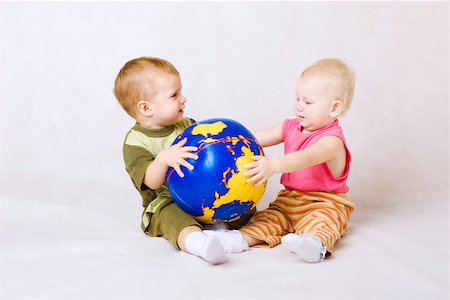 boy and girl with ball Stock Photo - Budget Royalty-Free & Subscription, Code: 400-06857496