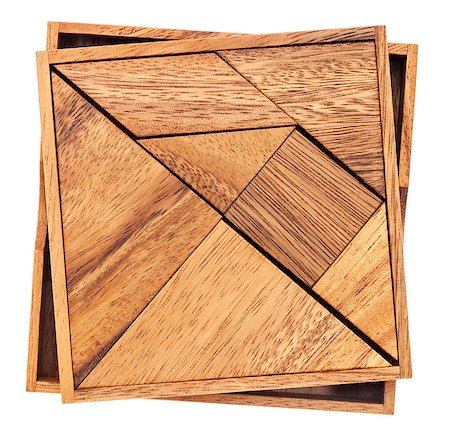 simsearch:400-07774007,k - Tangram, a traditional Chinese Puzzle Game made of different wood parts to build abstract figures from them, isolated on white Foto de stock - Royalty-Free Super Valor e Assinatura, Número: 400-06858094