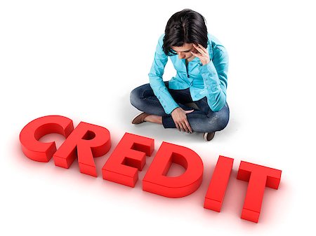 simsearch:400-06567183,k - Sad girl sits before the big red credit Stock Photo - Budget Royalty-Free & Subscription, Code: 400-06858114