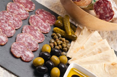 fresh cold cut platter with pita bread and pickles antipasti Stock Photo - Budget Royalty-Free & Subscription, Code: 400-06858388