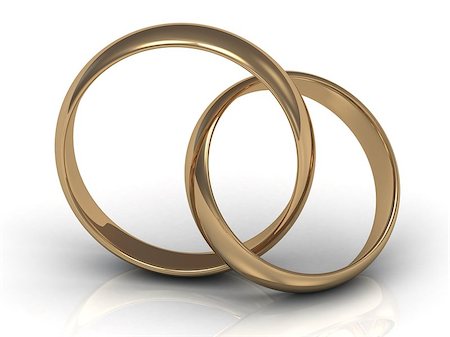 simsearch:400-05361582,k - One gold ring to a wedding in another gold ring Stock Photo - Budget Royalty-Free & Subscription, Code: 400-06858718