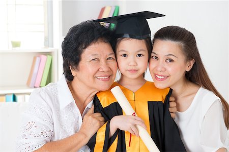 family degree - Kindergarten graduation. Happy Asian family, grandparent, parent and grandchild on her kindergarten graduate day. Stock Photo - Budget Royalty-Free & Subscription, Code: 400-06858939