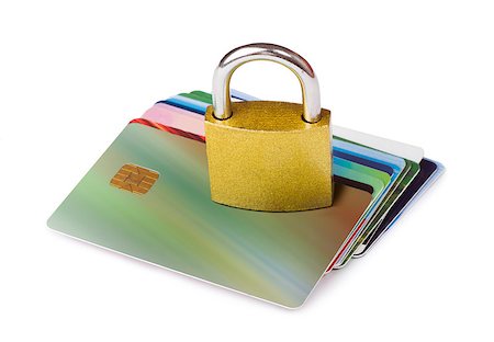 simsearch:400-04994290,k - Grey locked padlock and credit cards. Isolated studio shot. Fotografie stock - Microstock e Abbonamento, Codice: 400-06858951