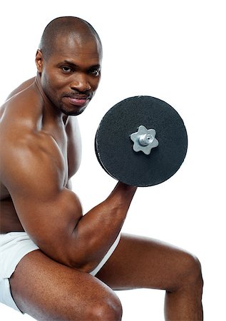 simsearch:400-06859184,k - Portrait of happy fit african man working out with dumbbells Stockbilder - Microstock & Abonnement, Bildnummer: 400-06859188