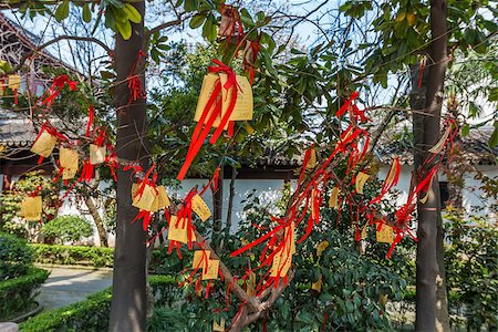 Paper prayers and wishes of Wen Miao confucian confucius temple in shanghai china popular republic Stock Photo - Budget Royalty-Free & Subscription, Code: 400-06859318
