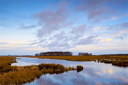 drenthe - cloudscape reflection in river before sunset Foto de stock - Royalty-Free Super Valor e Assinatura, Número: 400-06859558