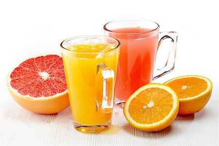 foodphoto (artist) - Freshly squeezed orange and red grapefruit juice Photographie de stock - Aubaine LD & Abonnement, Code: 400-06859676
