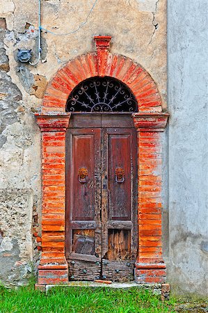Wooden Ancient Italian Door in Historic Center Stock Photo - Budget Royalty-Free & Subscription, Code: 400-06859768