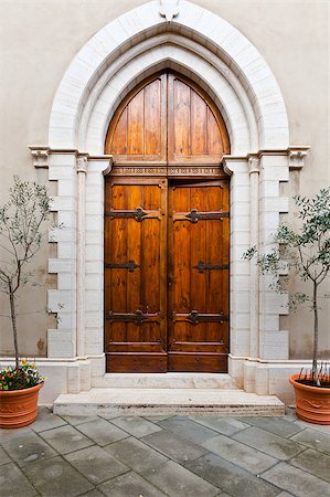 Wooden Ancient Italian Door in Historic Center Stock Photo - Budget Royalty-Free & Subscription, Code: 400-06859770