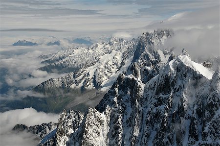 reach the mountaintop - Panoramic view of high Alps covered by snow in France Foto de stock - Super Valor sin royalties y Suscripción, Código: 400-06852224
