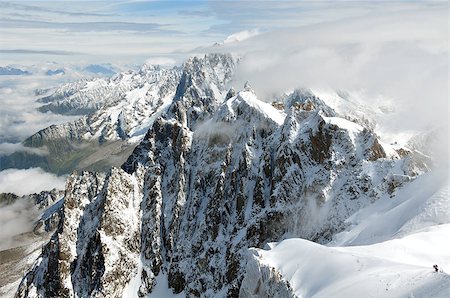 reach the mountaintop - Panoramic view of high Alps covered by snow in France. Foto de stock - Super Valor sin royalties y Suscripción, Código: 400-06852225