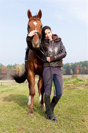 simsearch:400-07615021,k - equestrian with her horse on meadow Stock Photo - Budget Royalty-Free & Subscription, Code: 400-06852241