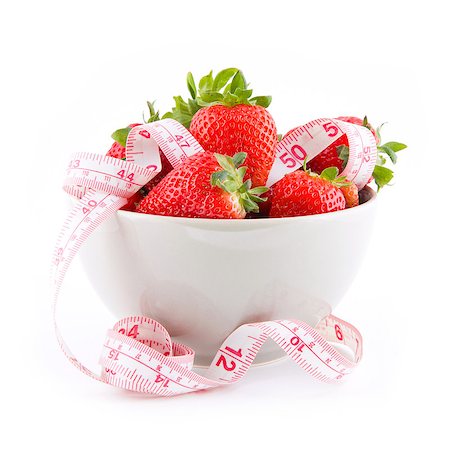 Fresh strawberries in a bowl with measure tape isolated Stock Photo - Budget Royalty-Free & Subscription, Code: 400-06852306