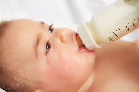 pictures of baby eating dinner with family - Feeding procedure of a little baby boy Stock Photo - Budget Royalty-Free & Subscription, Code: 400-06853386