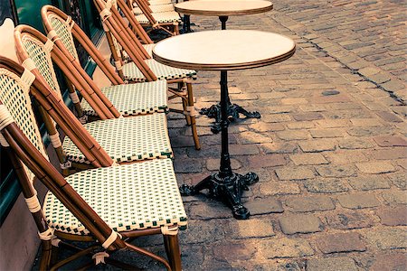 Street view of a coffee terrace with tables and chairs,paris France Stock Photo - Budget Royalty-Free & Subscription, Code: 400-06853473