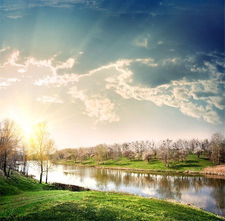 Spring landscape with the river and the sun Stockbilder - Microstock & Abonnement, Bildnummer: 400-06853888