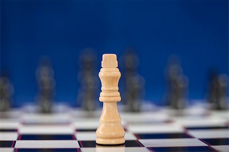 simsearch:640-03260643,k - White queen standing at the chessboard against blue background Stock Photo - Budget Royalty-Free & Subscription, Code: 400-06864284